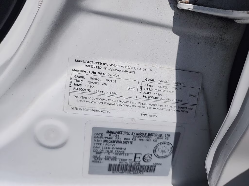 2024 Aspen White Tricoat Nissan Versa 1.6 SR FWD Sedan