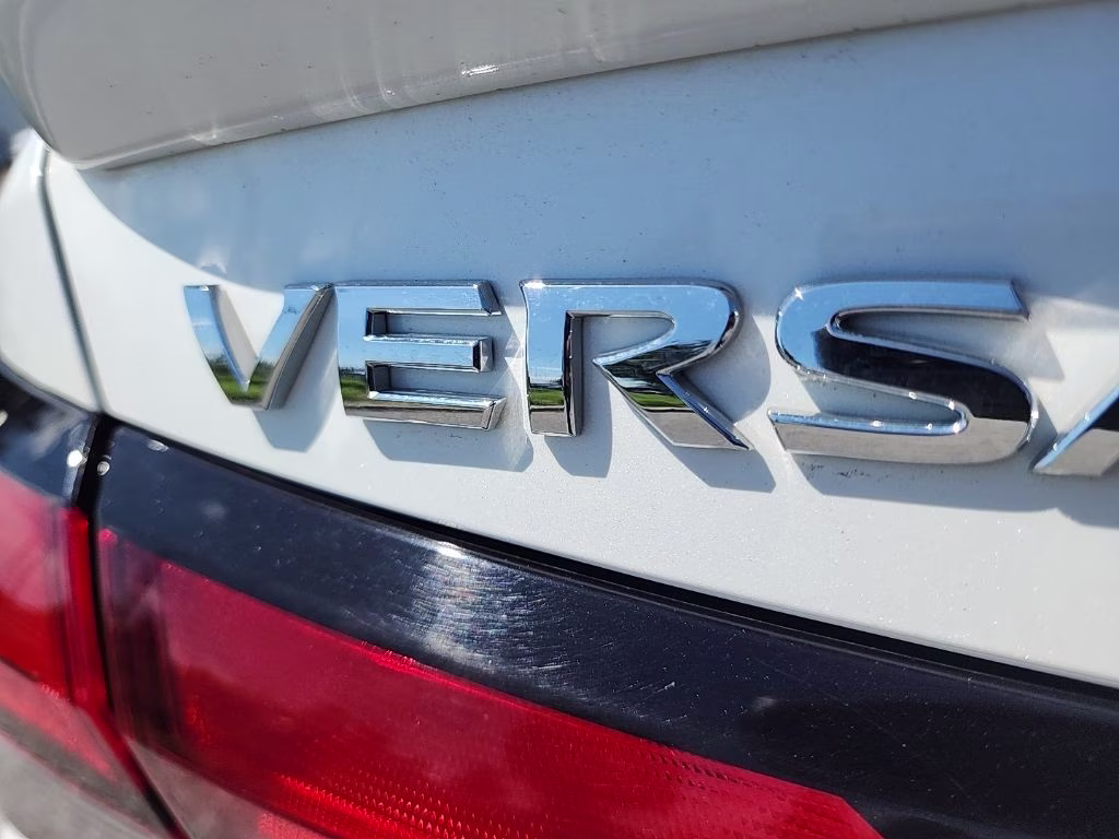 2024 Aspen White Tricoat Nissan Versa 1.6 SR FWD Sedan