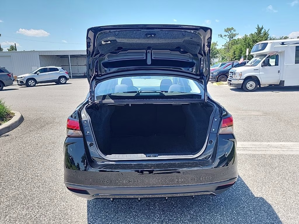 2024 Super Black Nissan Versa 1.6 SR FWD Sedan