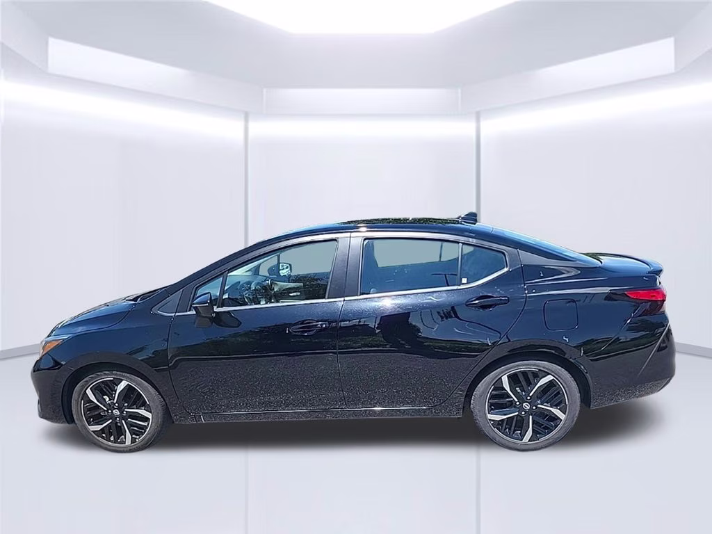 2024 Super Black Nissan Versa 1.6 SR FWD Sedan