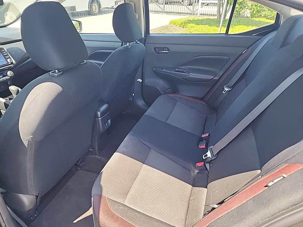 2024 Super Black Nissan Versa 1.6 SR FWD Sedan