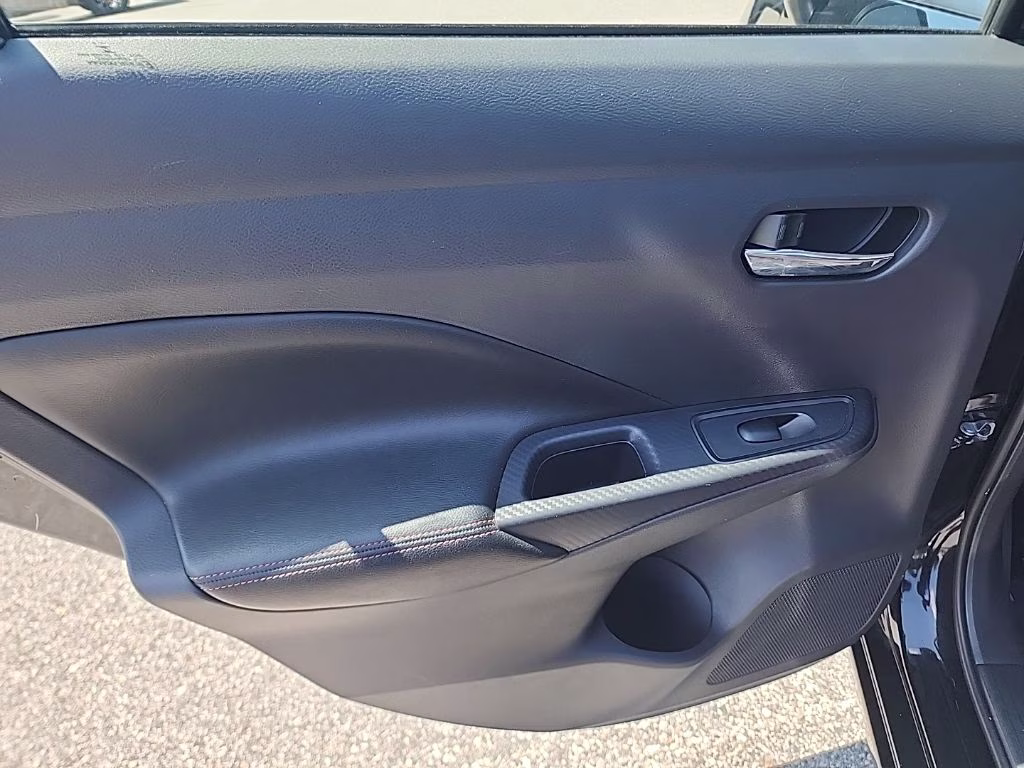 2024 Super Black Nissan Versa 1.6 SR FWD Sedan