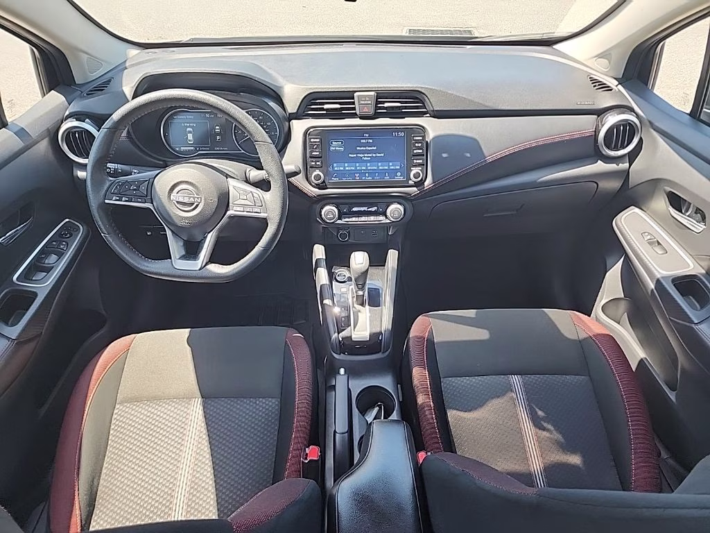 2024 Super Black Nissan Versa 1.6 SR FWD Sedan