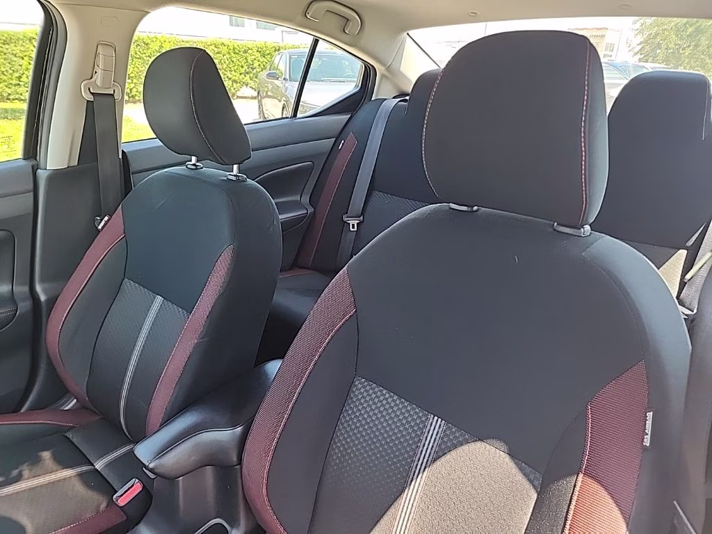 2024 Super Black Nissan Versa 1.6 SR FWD Sedan