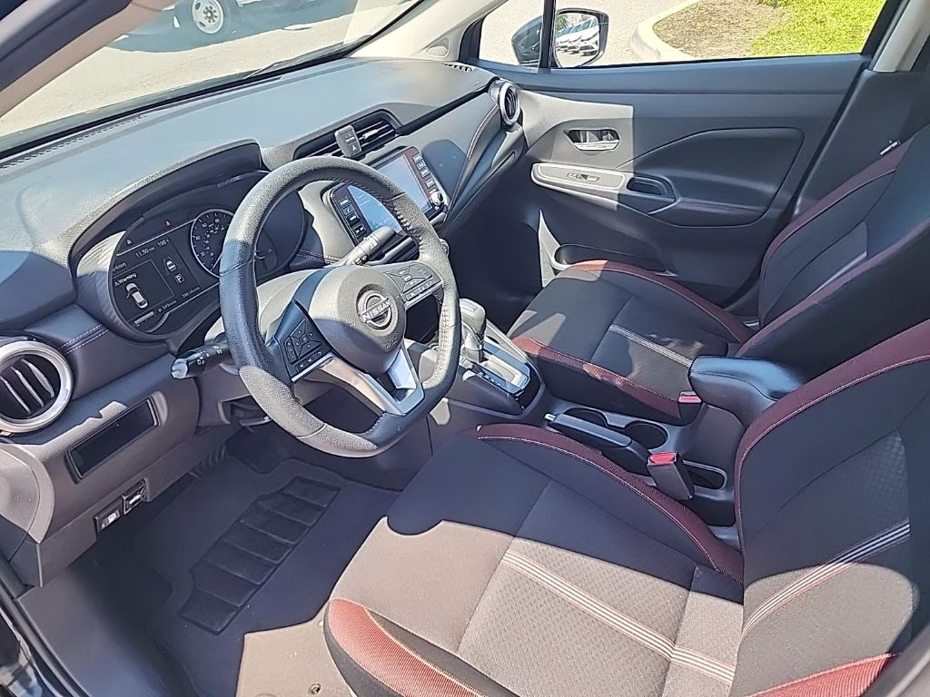 2024 Super Black Nissan Versa 1.6 SR FWD Sedan