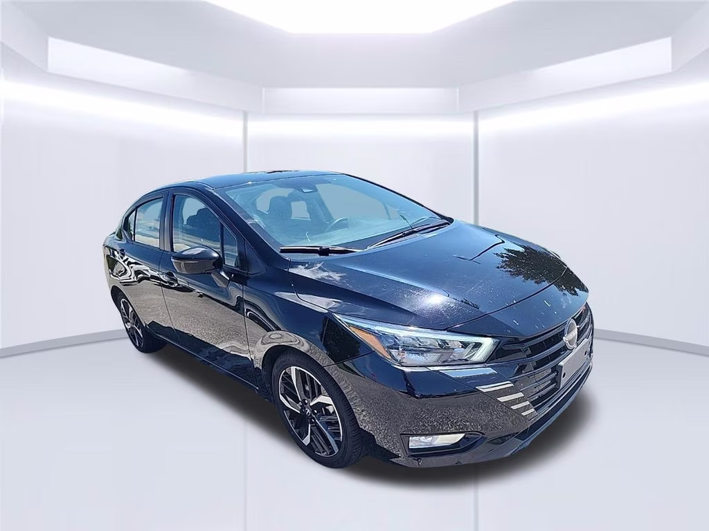 2024 Super Black Nissan Versa 1.6 SR FWD Sedan