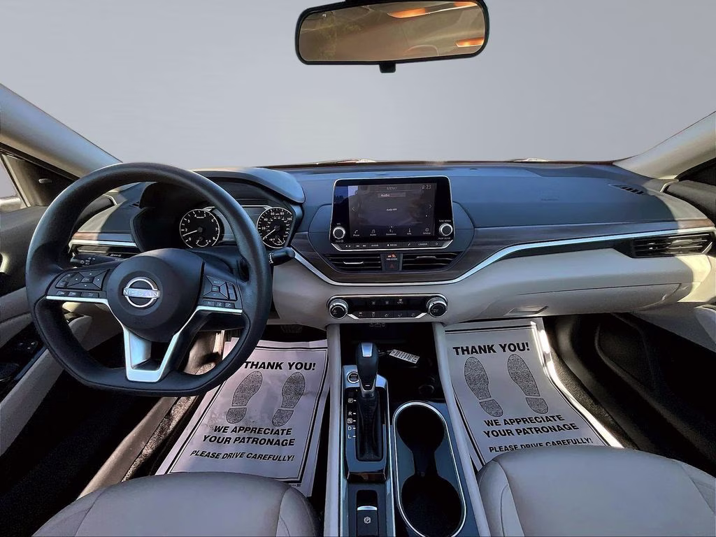 2023 Garnet Pearl Metallic Nissan Altima 2.5 SV AWD Sedan