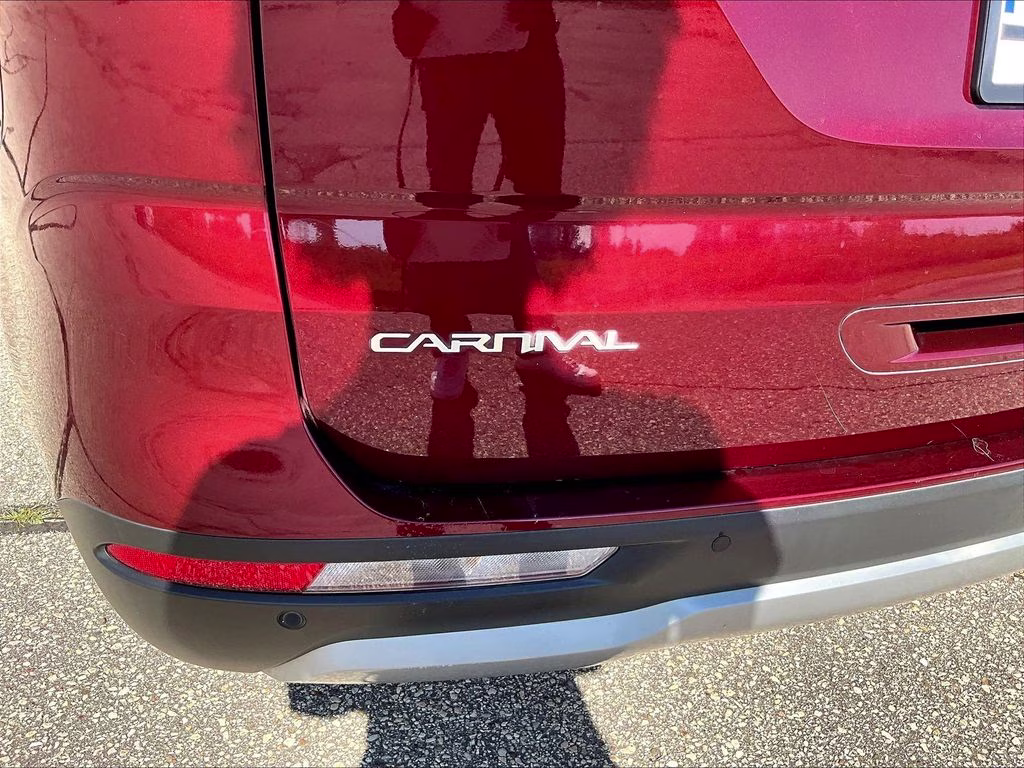 2024 Flare Red Kia Carnival LX Seat Package FWD Van