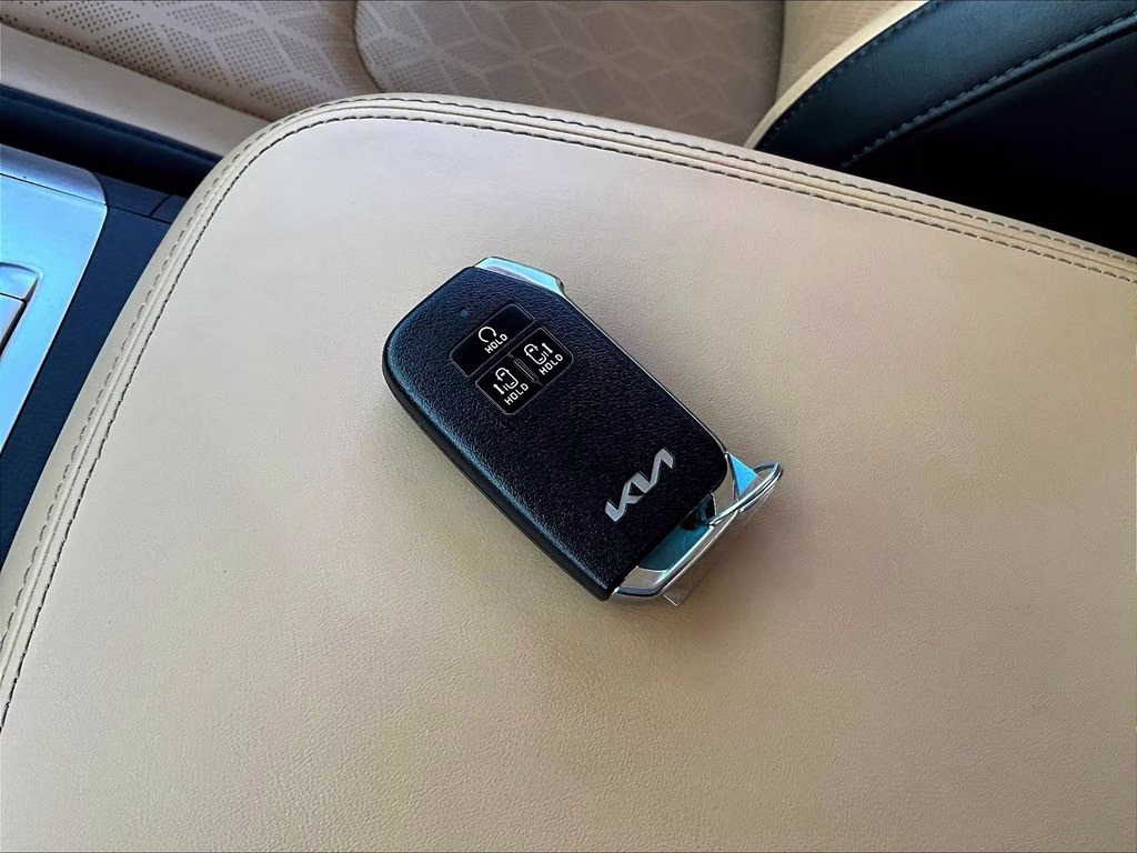 2024 Flare Red Kia Carnival LX Seat Package FWD Van
