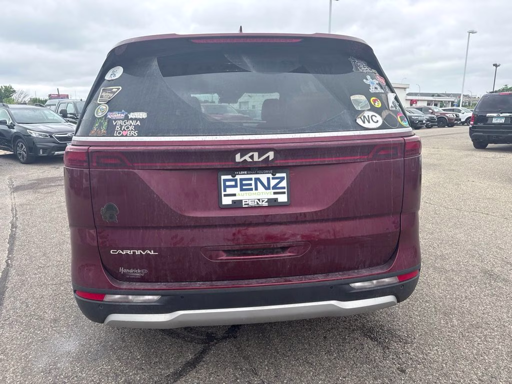 2024 Flare Red Kia Carnival LX Seat Package FWD Van
