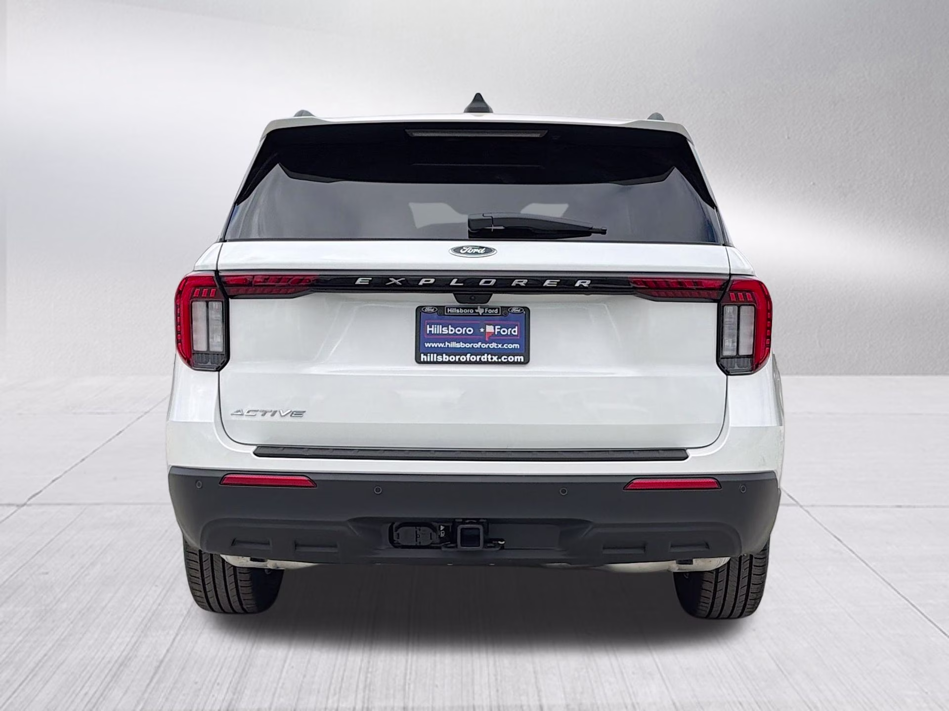 2026 Star White Metallic Tri-Coat Ford Explorer Active RWD SUV