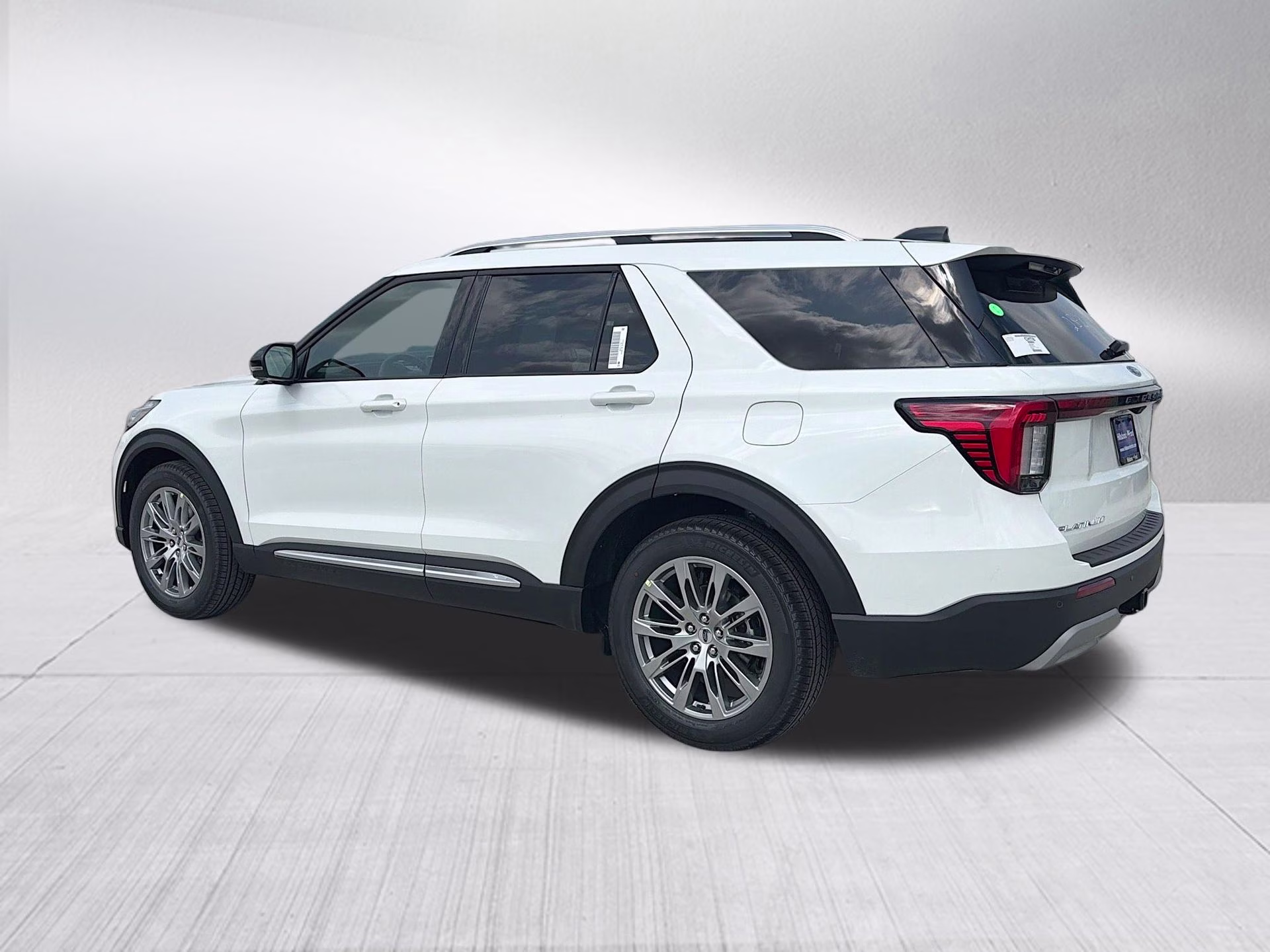 2026 Star White Metallic Tri-Coat Ford Explorer Platinum RWD SUV