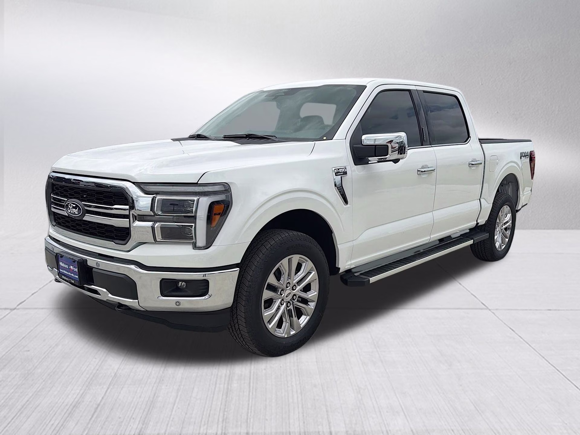 2026 Star White Metallic Tri-Coat Ford F-150 Lariat 4X4 Truck