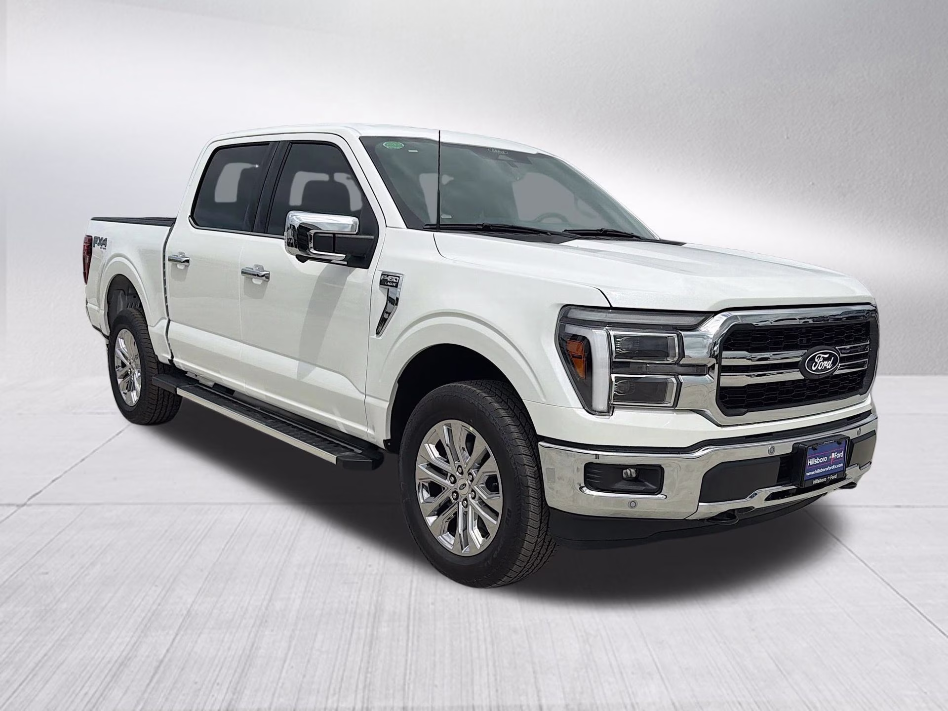 2026 Star White Metallic Tri-Coat Ford F-150 Lariat 4X4 Truck