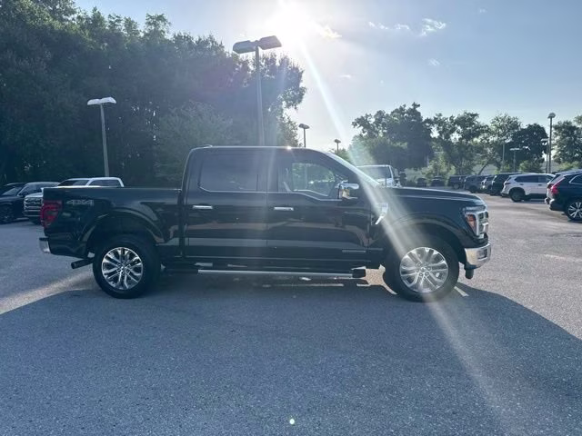 2024 Agate Black Metallic Ford F-150 LARIAT Crew Cab Pickup 4X4 Truck