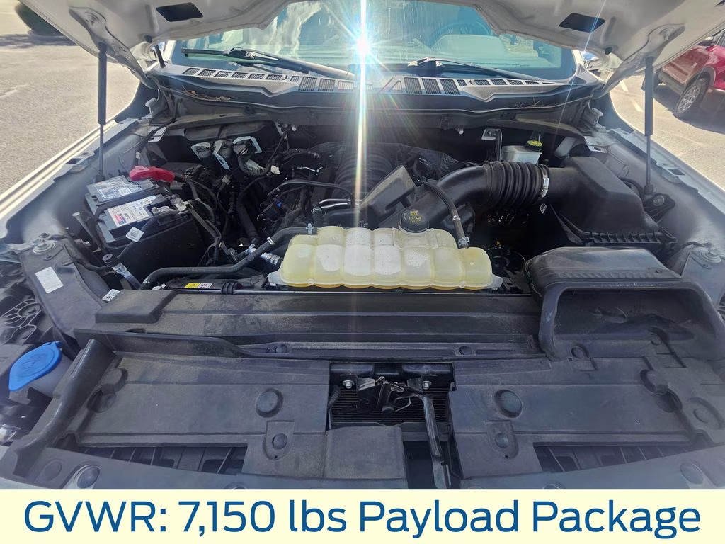 2023 Star White Metallic Tri-Coat Ford F-150 Lariat 4X4 Truck