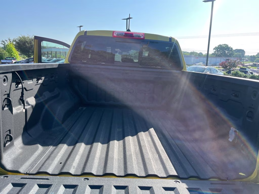 2023 Solar Flare Metallic GMC Canyon AT4X 4X4 Truck