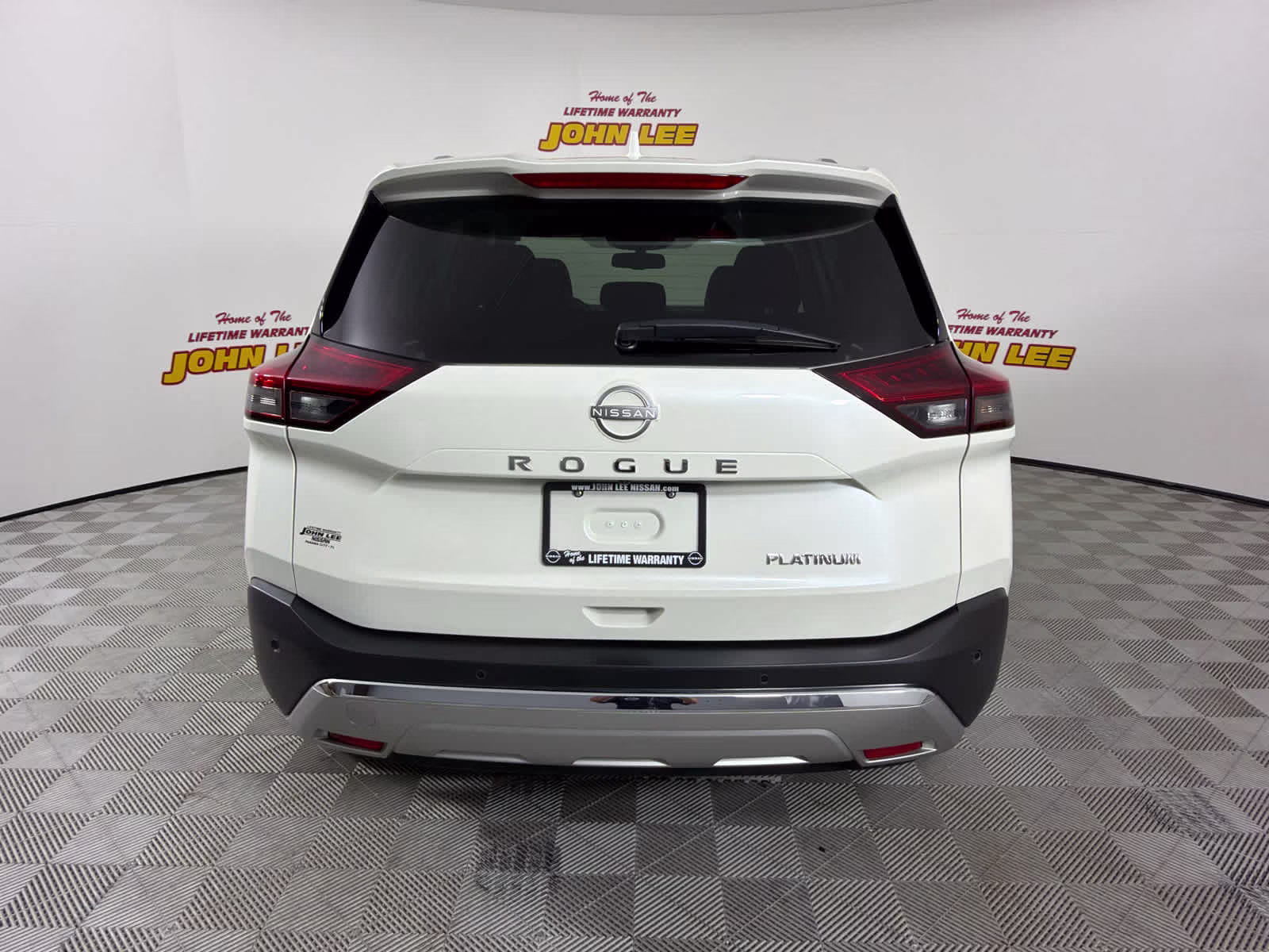 2023 Pearl White Tricoat Nissan Rogue Platinum FWD SUV