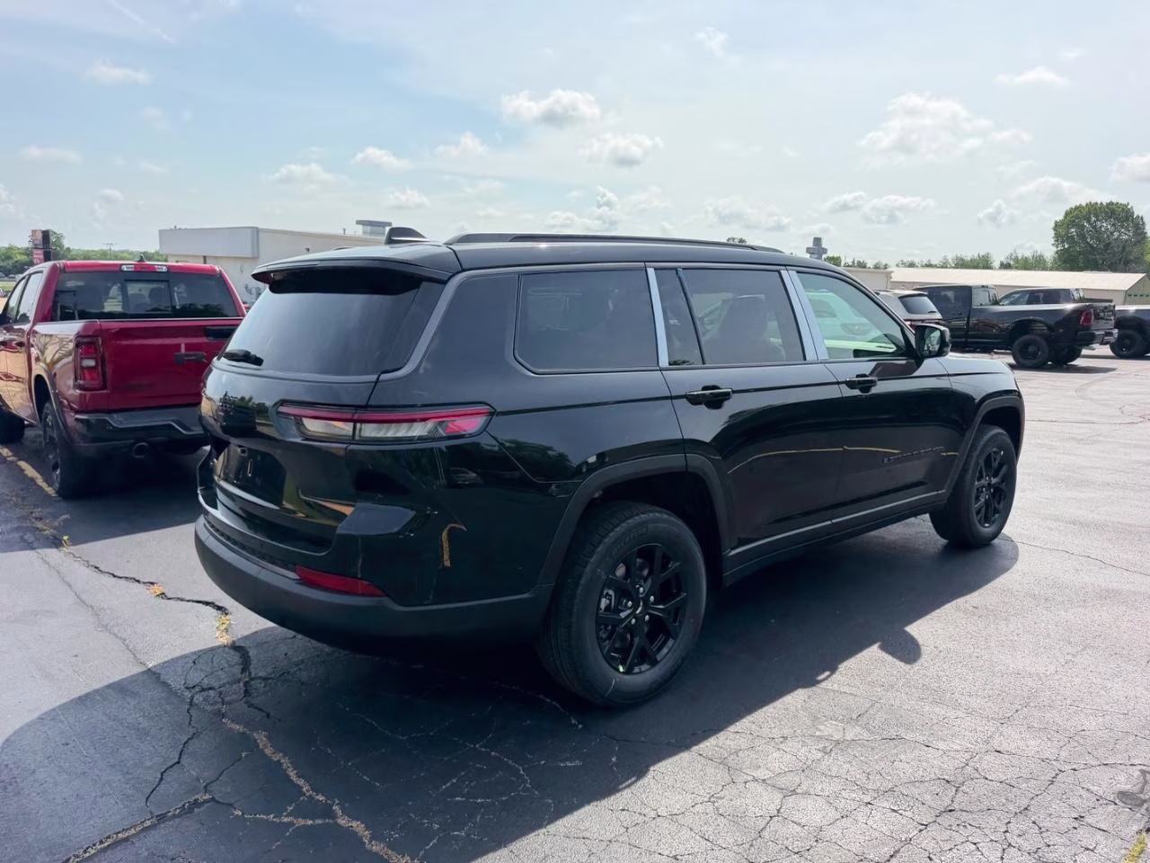 2026 Diamond Black Crystal Pearlcoat Jeep Grand Cherokee L Laredo 4X4 SUV