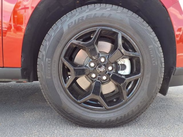 2023 Hot Pepper Red Metallic Tinted Clearcoat Ford Maverick Lariat AWD Truck