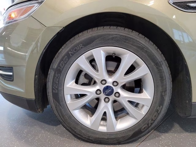 2012 Green Ford Taurus SEL AWD Sedan