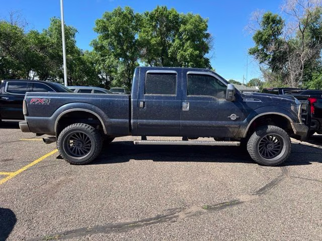 2013 Blue Ford Super Duty F-350 SRW Lariat 4X4 Truck