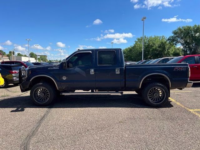 2013 Blue Ford Super Duty F-350 SRW Lariat 4X4 Truck
