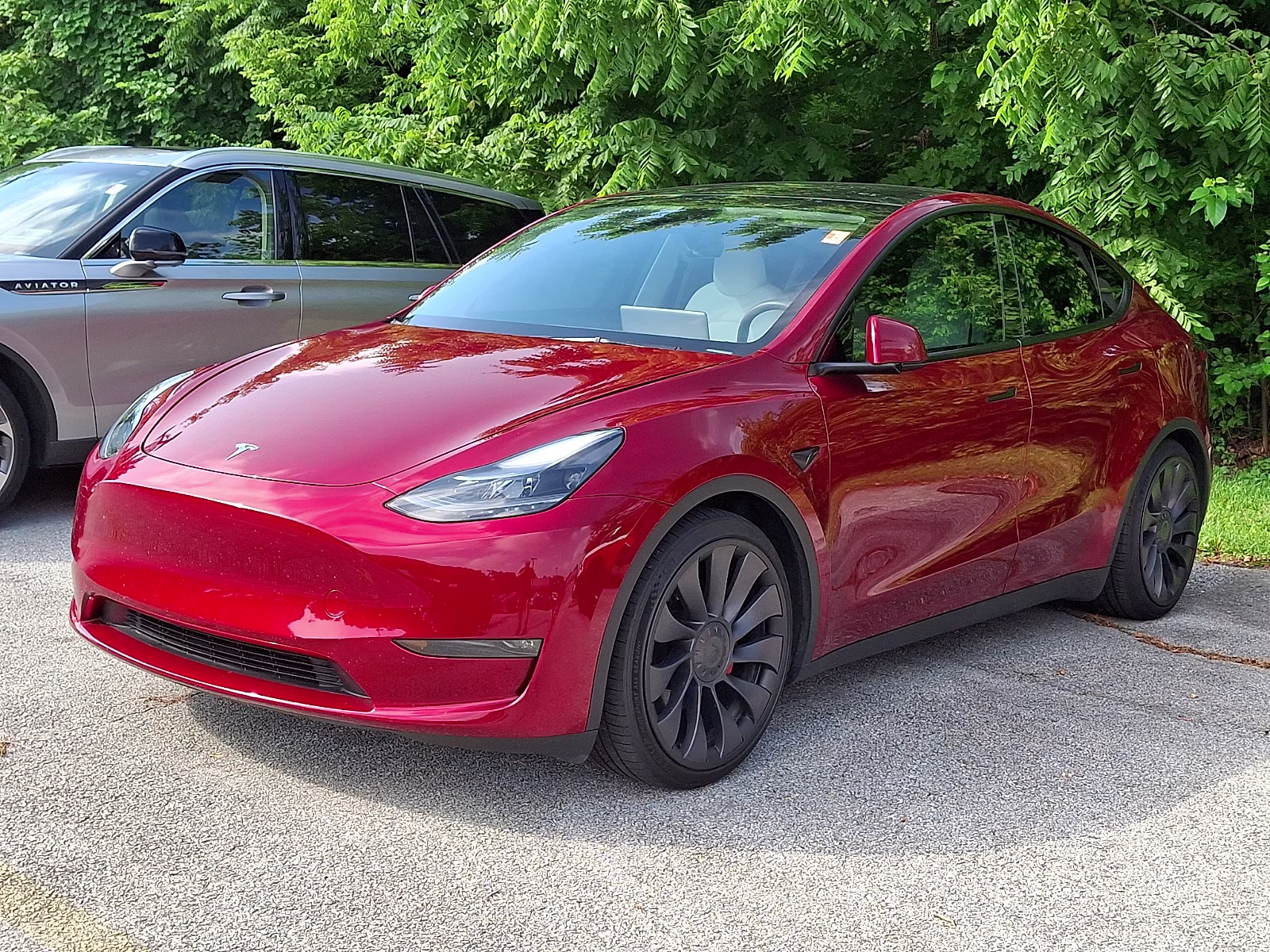 2024 Ultra Red Tesla Model Y Performance Dual Motor All-Wheel Drive AWD