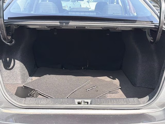 2025 Gun Metallic Nissan Versa 1.6 SV FWD Sedan