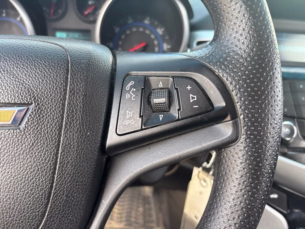 2015 Silver Ice Metallic Chevrolet Cruze LS FWD Sedan
