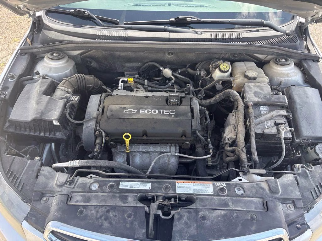 2015 Silver Ice Metallic Chevrolet Cruze LS FWD Sedan