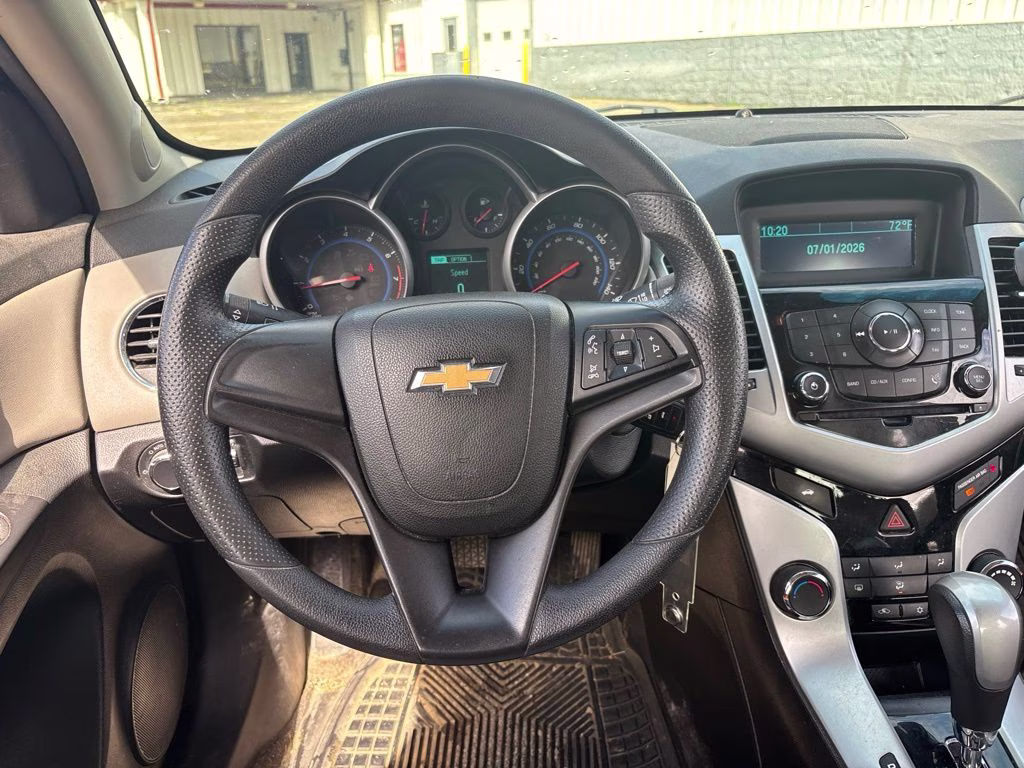 2015 Silver Ice Metallic Chevrolet Cruze LS FWD Sedan