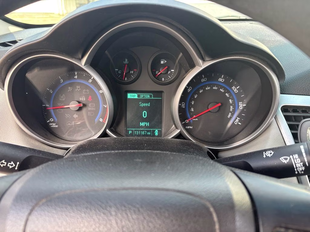 2015 Silver Ice Metallic Chevrolet Cruze LS FWD Sedan