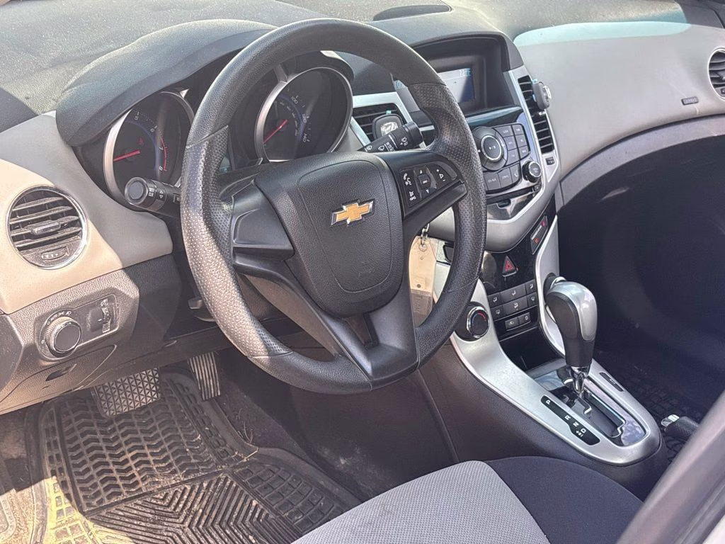 2015 Silver Ice Metallic Chevrolet Cruze LS FWD Sedan
