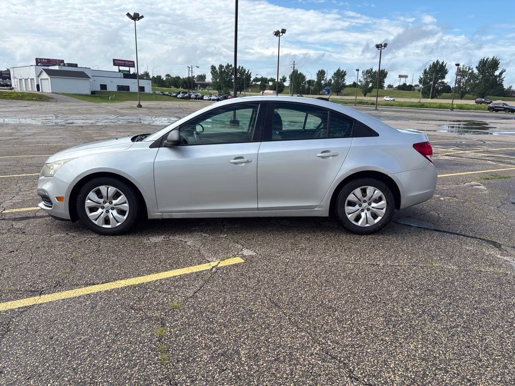 2015 Silver Ice Metallic Chevrolet Cruze LS FWD Sedan