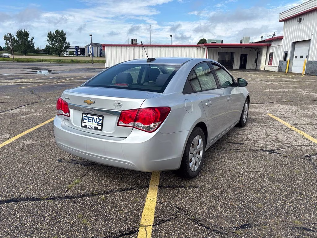 2015 Silver Ice Metallic Chevrolet Cruze LS FWD Sedan