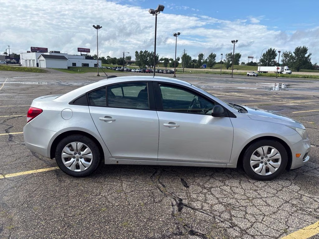 2015 Silver Ice Metallic Chevrolet Cruze LS FWD Sedan