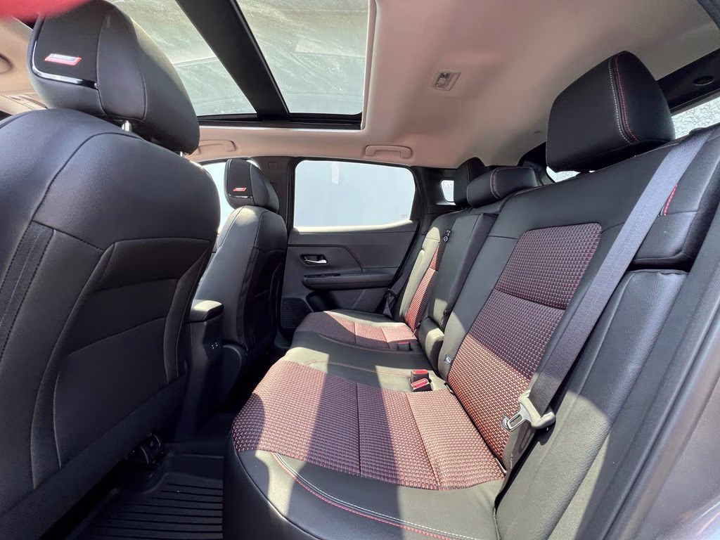 2026 Gun Metallic/Scarlet Ember Tintcoat Nissan Kicks SR AWD SUV