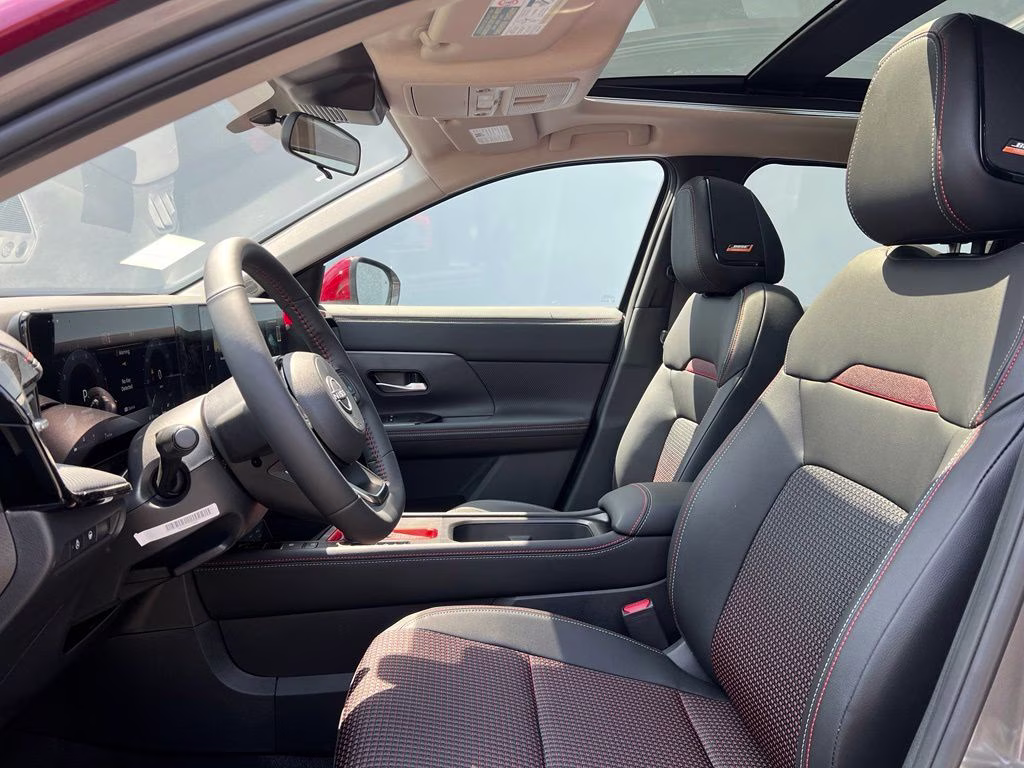 2026 Gun Metallic/Scarlet Ember Tintcoat Nissan Kicks SR AWD SUV