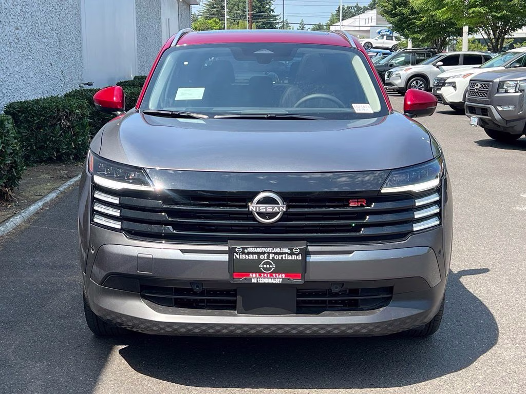 2026 Gun Metallic/Scarlet Ember Tintcoat Nissan Kicks SR AWD SUV