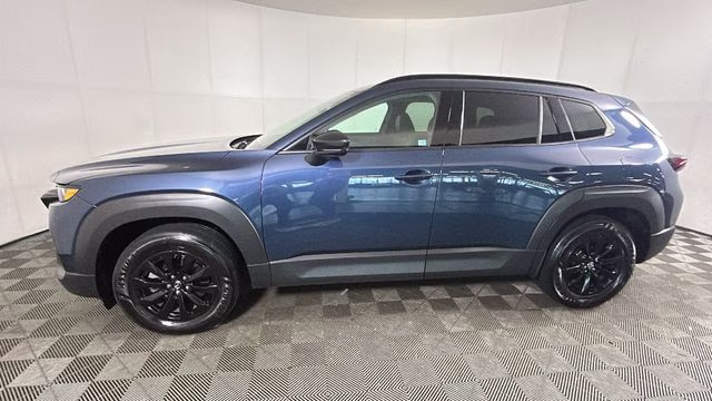 2026 Ingot Blue Metallic Mazda CX-50 Hybrid Premium AWD SUV
