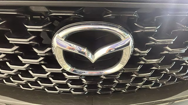 2026 Ingot Blue Metallic Mazda CX-50 Hybrid Premium AWD SUV