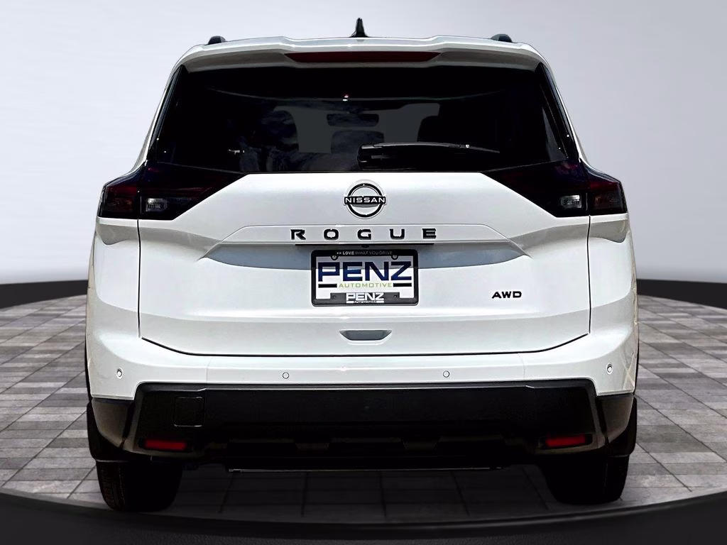 2026 Everest White Pearl Tricoat Nissan Rogue Dark Armor AWD SUV