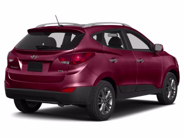 2015 Garnet Red Mica Hyundai Tucson SE AWD SUV