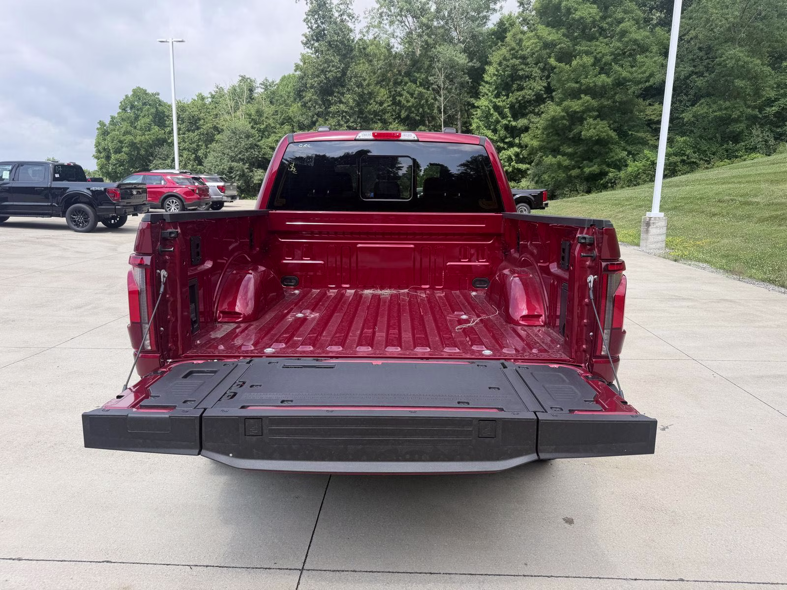 2026 Ruby Red Metallic Tinted Clearcoat Ford F-150 LARIAT 4X4 Truck