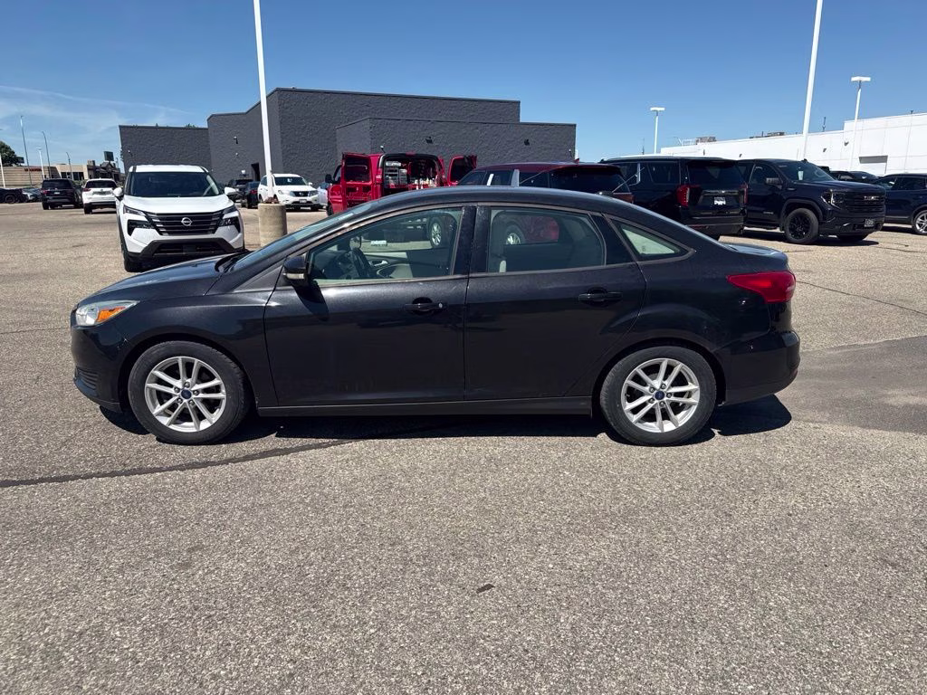 2015 Tuxedo Black Ford Focus SE FWD Sedan