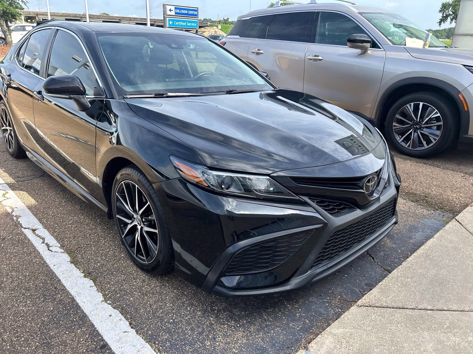 2023 Midnight Black Metallic Toyota Camry SE FWD Sedan