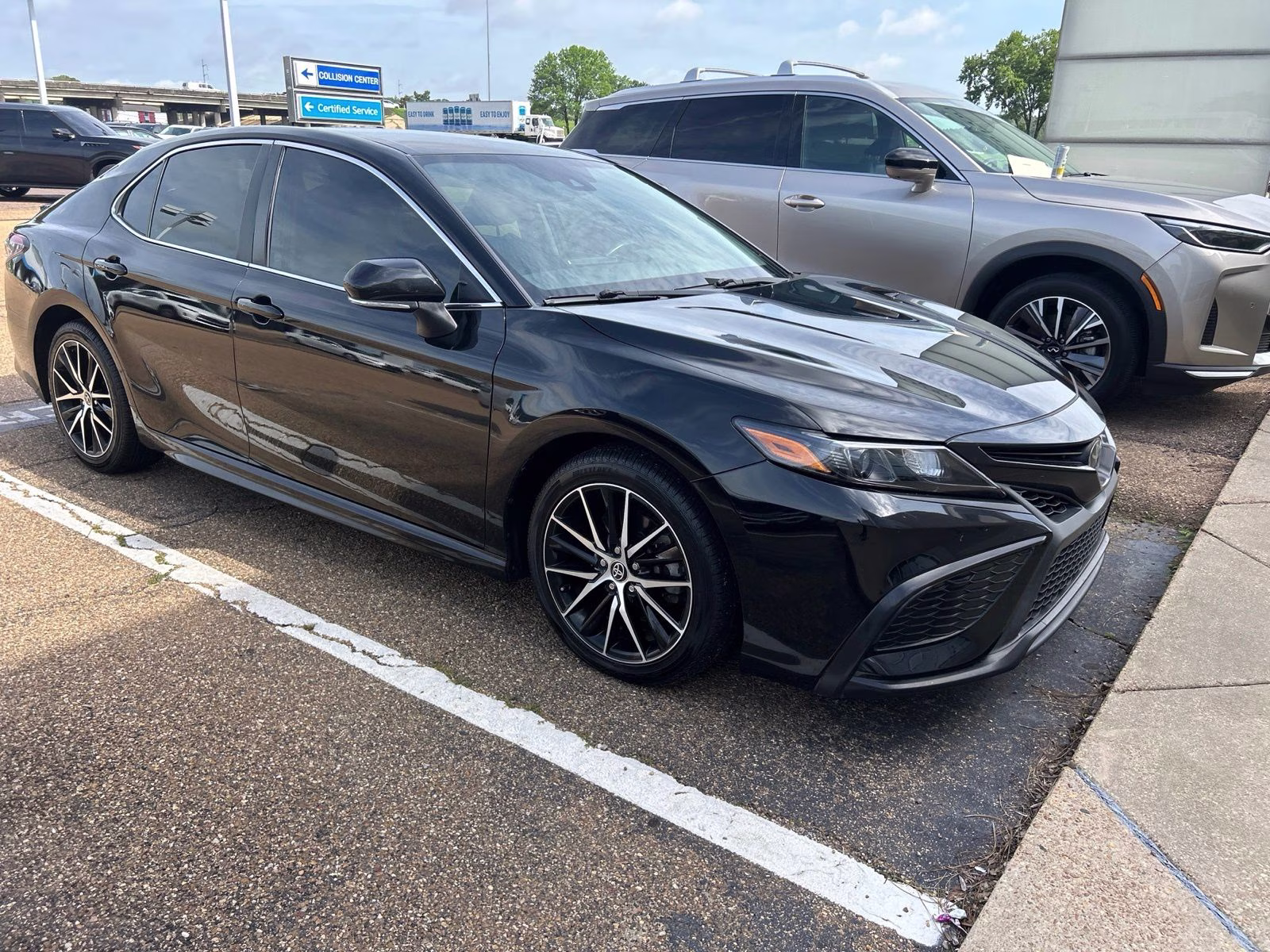 2023 Midnight Black Metallic Toyota Camry SE FWD Sedan