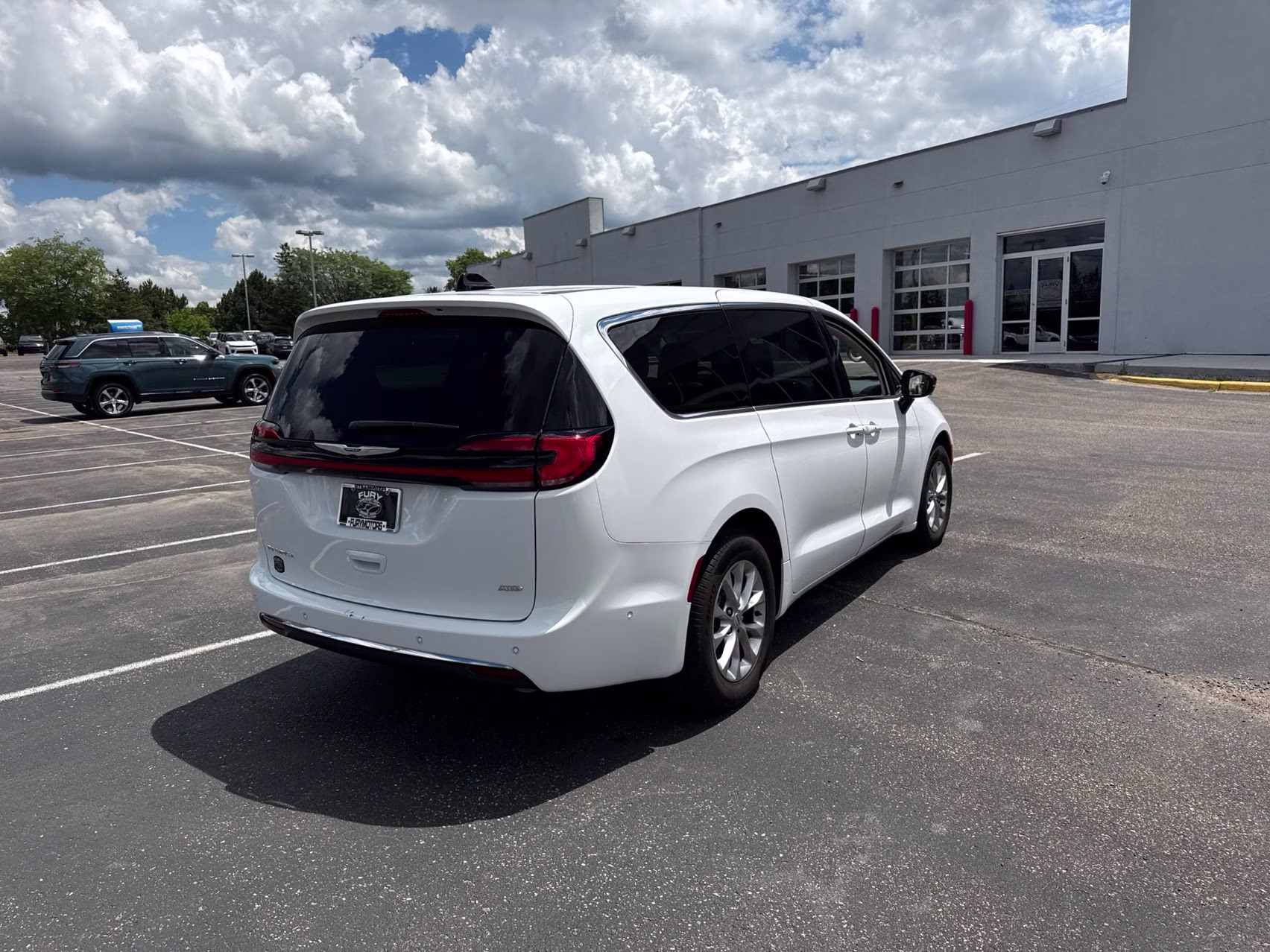 2024 Bright White Clearcoat Chrysler Pacifica Touring L AWD Van