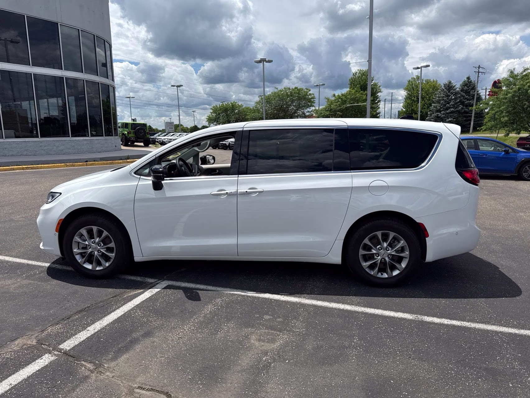 2024 Bright White Clearcoat Chrysler Pacifica Touring L AWD Van